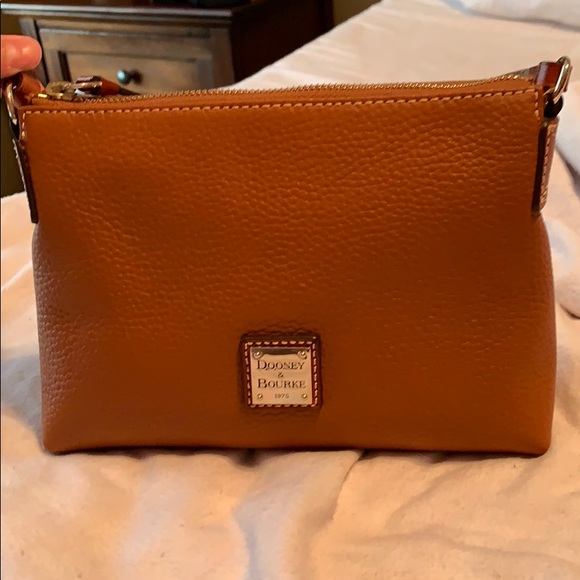Dooney & Bourke Handbags - Dooney and bourke pebble leather pouchette Dooney & Bourke Handbags - Dooney and bourke pebble leather pouchette